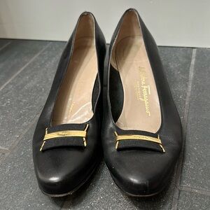 Black Salvatore Ferragamo 10.5 small scuff on left toes.